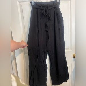 Black wide leg pants, size 2. Has belt to tie at waist, belt loops. Lightweight